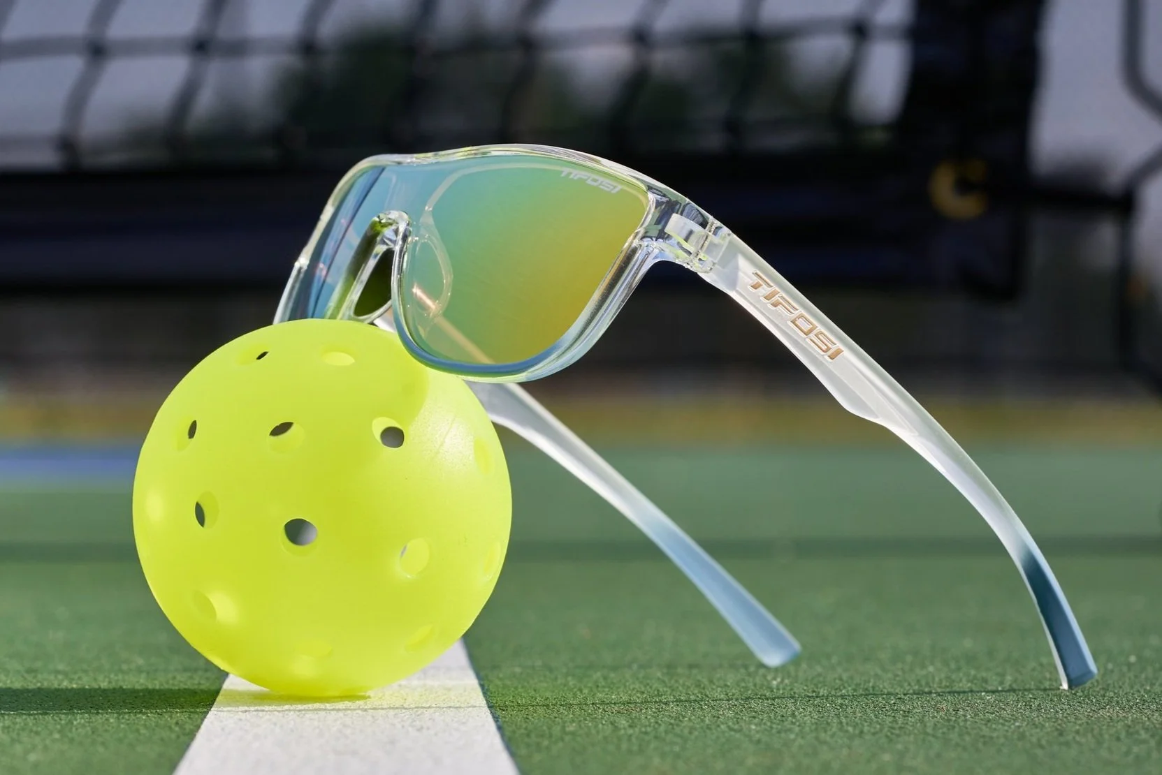 Athletes playing pickleball with Tifosi sunglasses